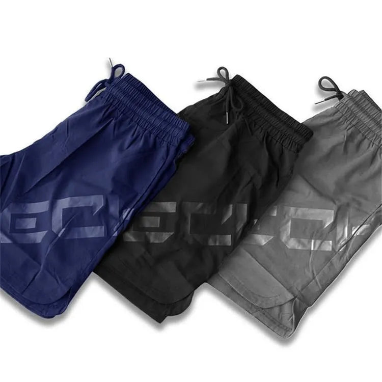 Men's elastic quick-drying nylon sports shorts in black colour for summer training activities