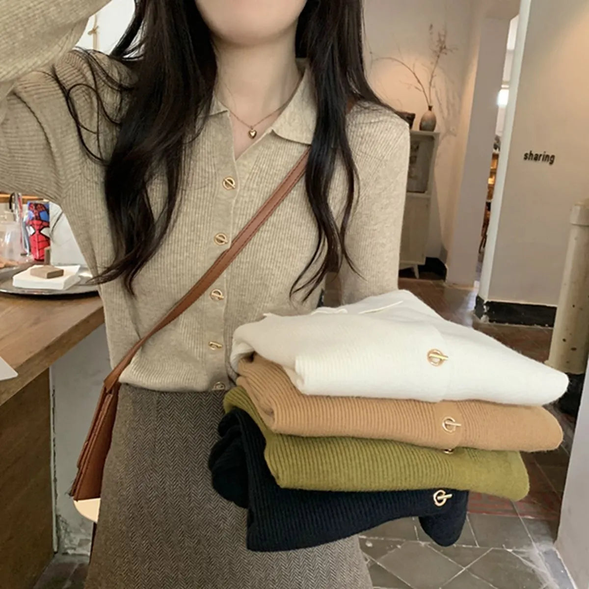 Gentle long-sleeved viscose cardigan top in loose fit, shown in oatmeal colour.