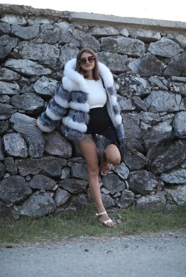 Loose hooded women's coat in artificial fur, shown in brown and white silver fox colours.