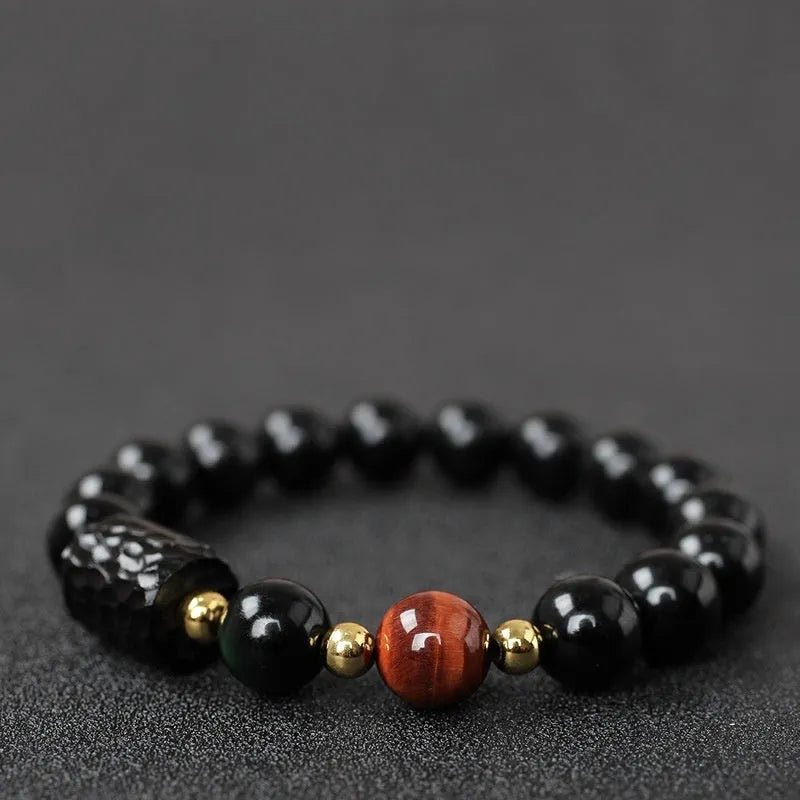 Obsidian and tiger eye bracelet with 10mm beads and circle design