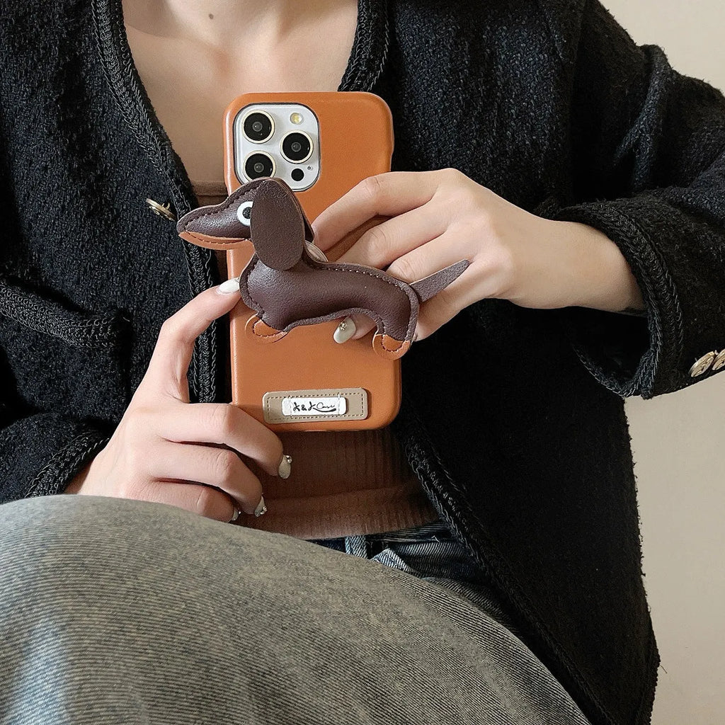 Sausage dog bracket phone case with imitation leather finish in black shell, compatible with iPhone models
