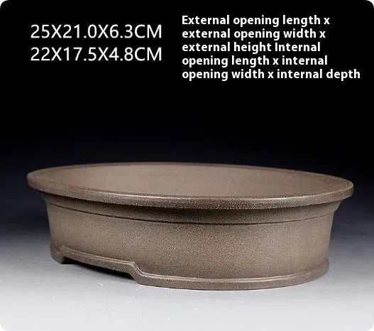 Handmade oval purple sand clay bonsai flower pot for succulents and orchids.