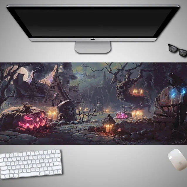 Large Halloween patterned gaming mouse pad on a desk showing non-slip rubber base and extra-long design.