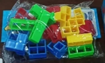 Plastic balance stacking game with colourful building blocks on chassis for family play