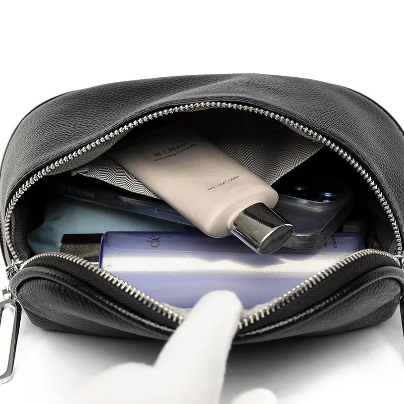 Women's soft PU leather messenger bag in saddle shape with single strap and internal zipper compartment