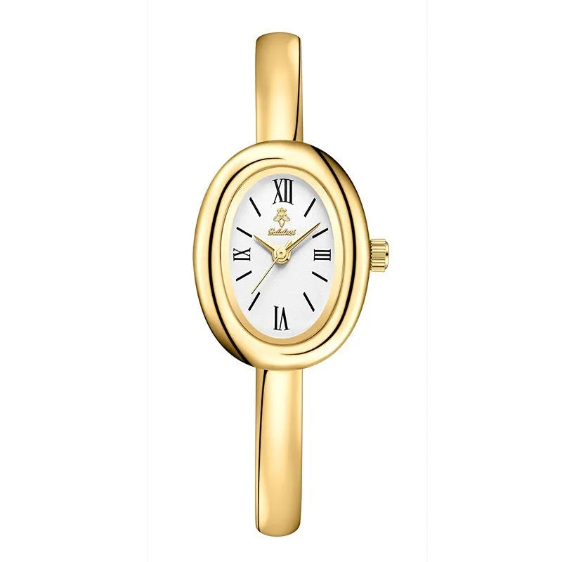 Women's oval retro quartz watch in gold with spiral pattern and slim 8mm profile