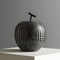 Resin apple and pear ornaments, black high model 17cm by 14cm and white low model 16cm by 12cm.