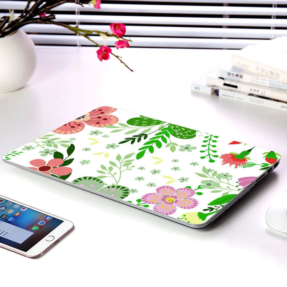 Plastic laptop protective shell with a floral pattern design for MacBook Air and MacBook Pro models.