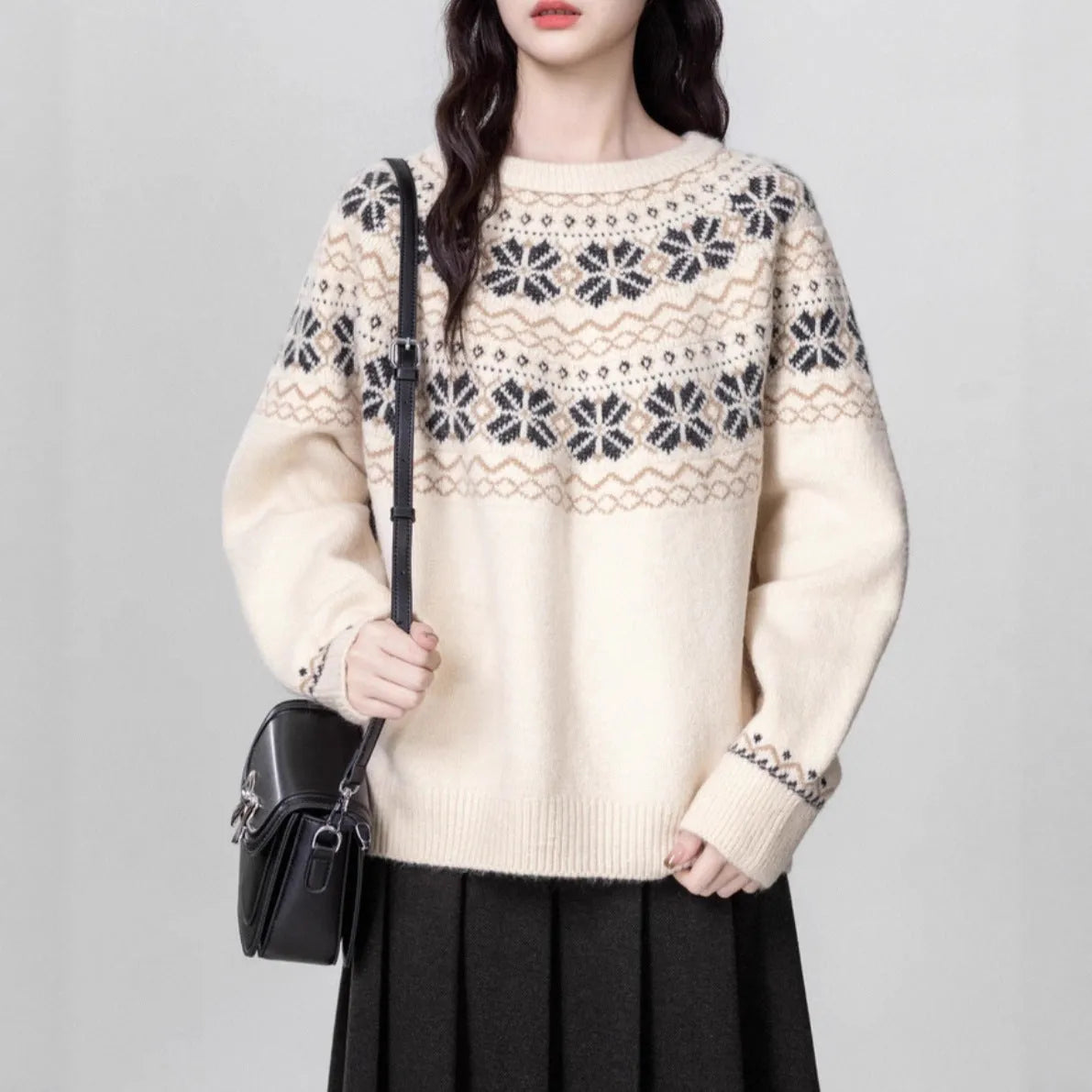 Women's Milky White vintage Fair Isle geometric knit pullover sweater on a hanger.