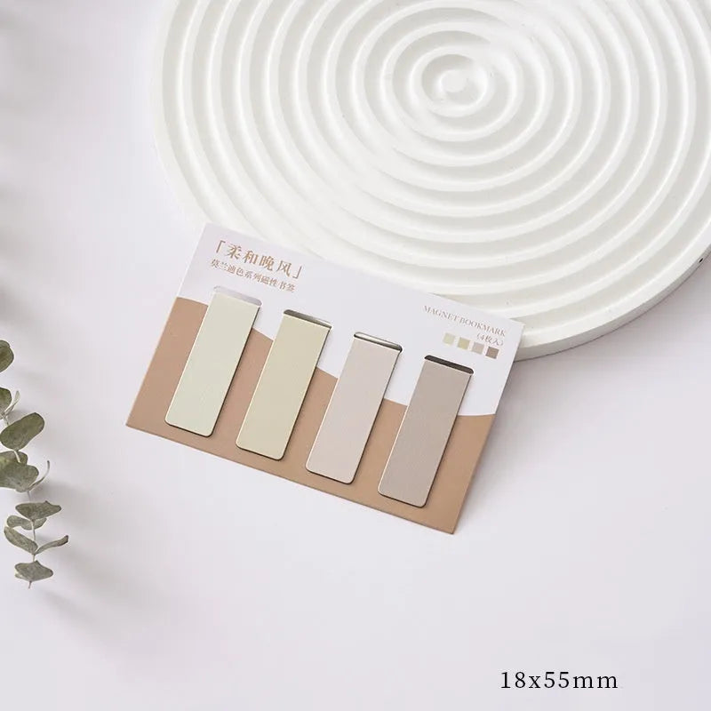 Set of four miniature magnetic bookmarks in soft Morandi series colour blocks on a white background.