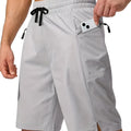 Men's quick-drying beach shorts in solid colours showing straight-leg design and polyester fabric texture