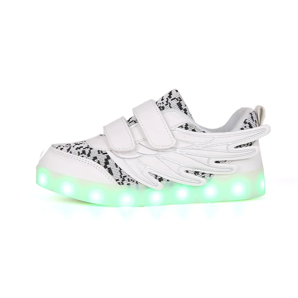Children's plum red and white LED light-up trainers with USB charging port on the side.
