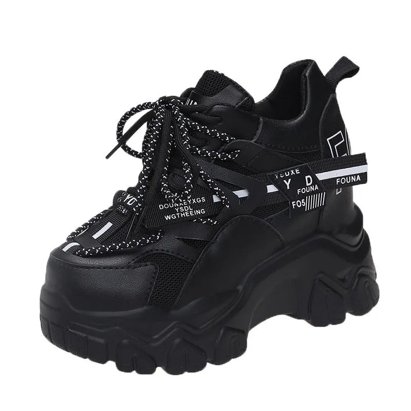 White women's low-top platform sports shoes with a cross-strap and breathable mesh upper on a rubber sole.