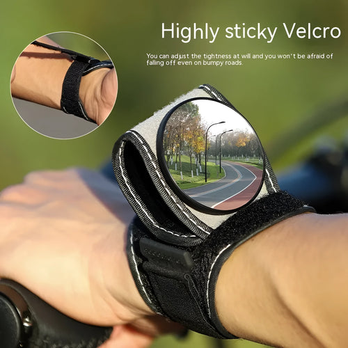 Black nylon bicycle rear-view mirror mounted on handlebars