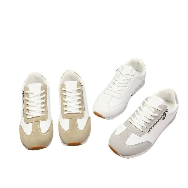 Women's flat-heeled shoes in grey, white and Champagne colours with artificial PU upper and rubber sole.