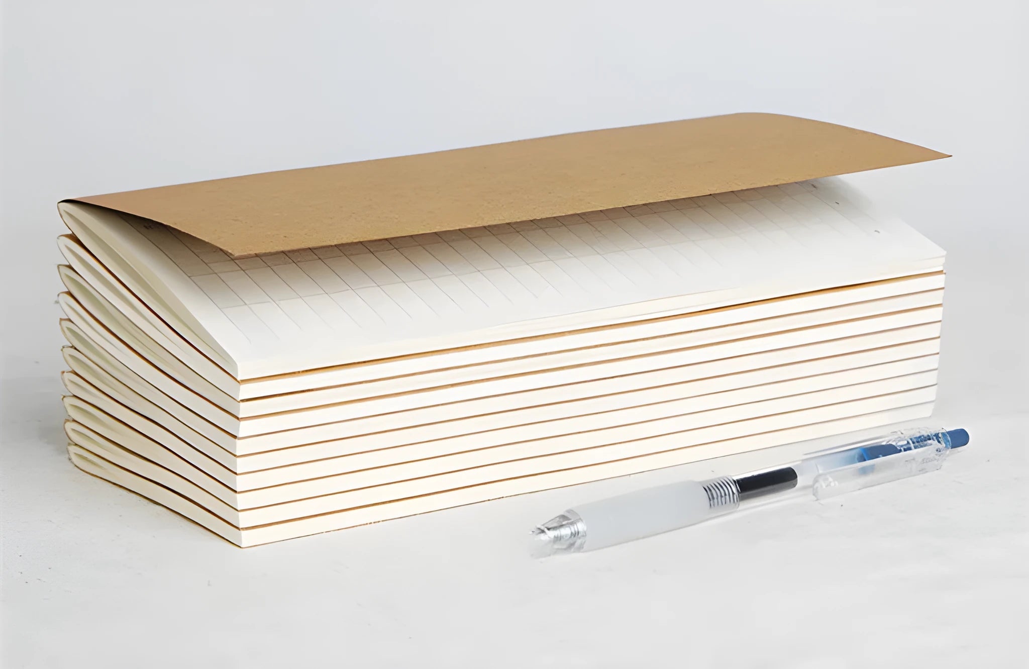 Diary refill inner core showing saddle stitch binding and 11x21cm dimensions