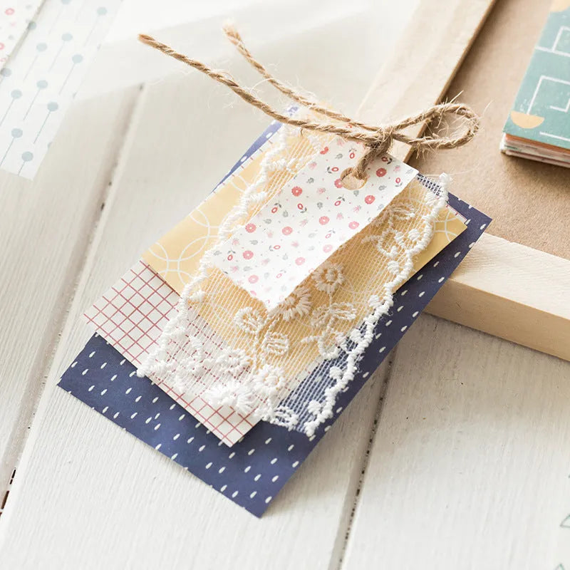 Pack of 50 retro collage note papers in ten dessert colours, each sheet sized 56mm by 83mm.