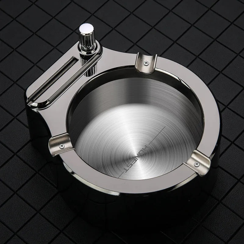 Large blue metal ashtray with integrated sliding stick permanent match lighter and three cigarette slots.