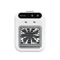 Ivory white portable air cooler with touchscreen panel and USB cable on a desk
