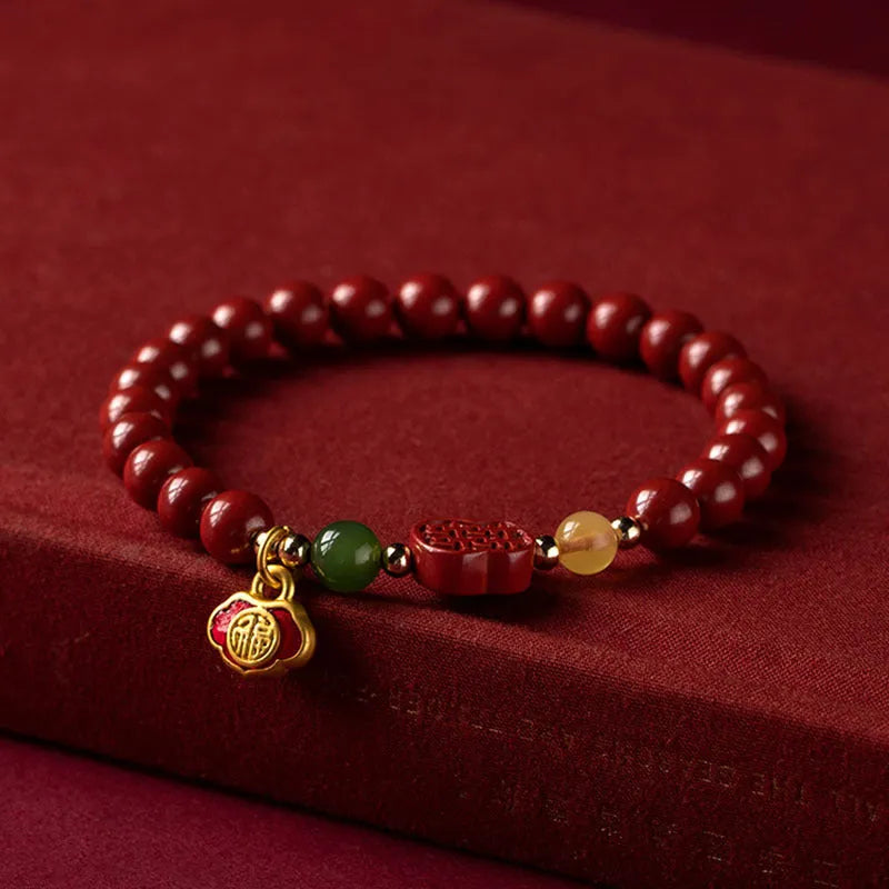 Fu character cinnabar and emperor sandstone beaded bracelet in new Chinese style.