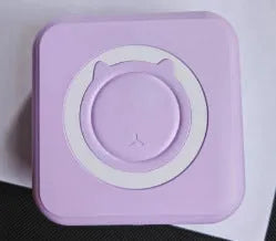 Pocket mini thermal printer in Macaron Blue with USB cable on white background