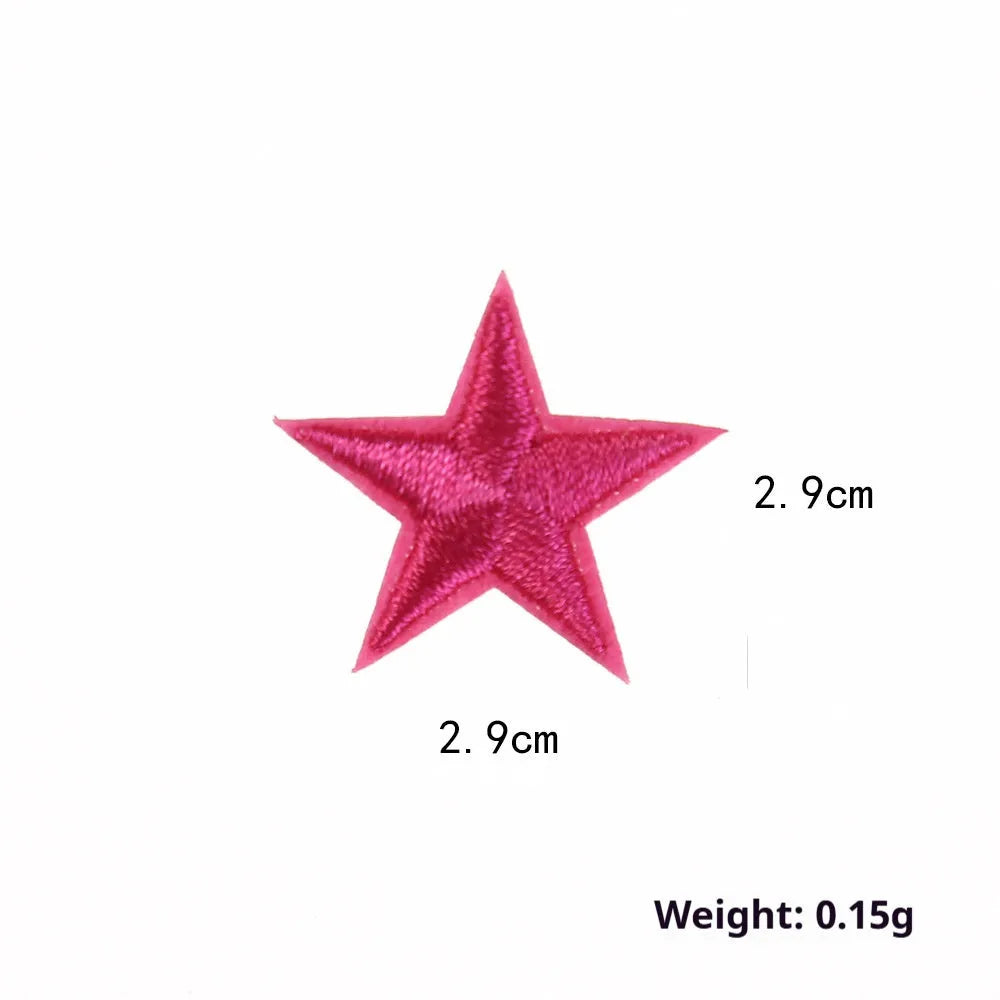 Colourful five-pointed star cloth embroidery stickers for DIY clothing decoration on a fabric background.