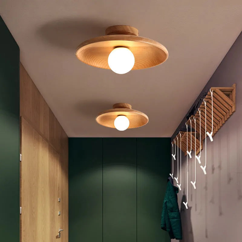 Solid wood modern minimalist ceiling lamp with glass shade in three sizes.