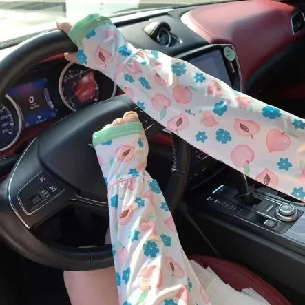 A pair of lightweight ice silk sun protection sleeve gloves in a floral print pattern, covering from wrist to elbow.