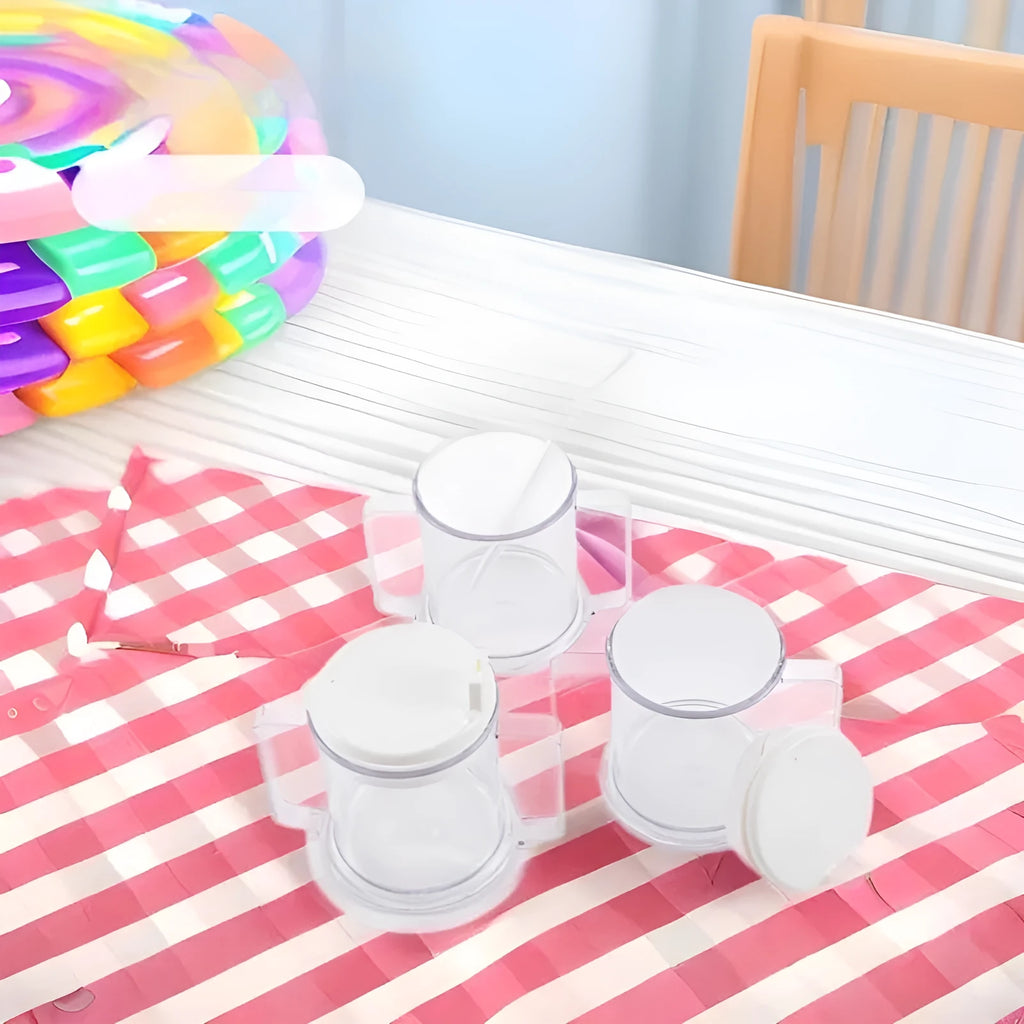 Transparent plastic spill-proof drinking cup on a table