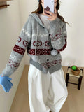 A beige, loose-fitting brocade knit sweater coat for plus size women with a geometric pattern.