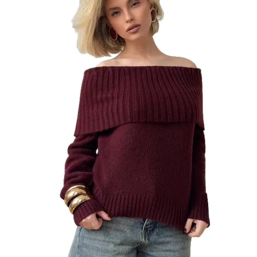 Grey off-the-shoulder sweater with a 3D pattern, shown on a model.