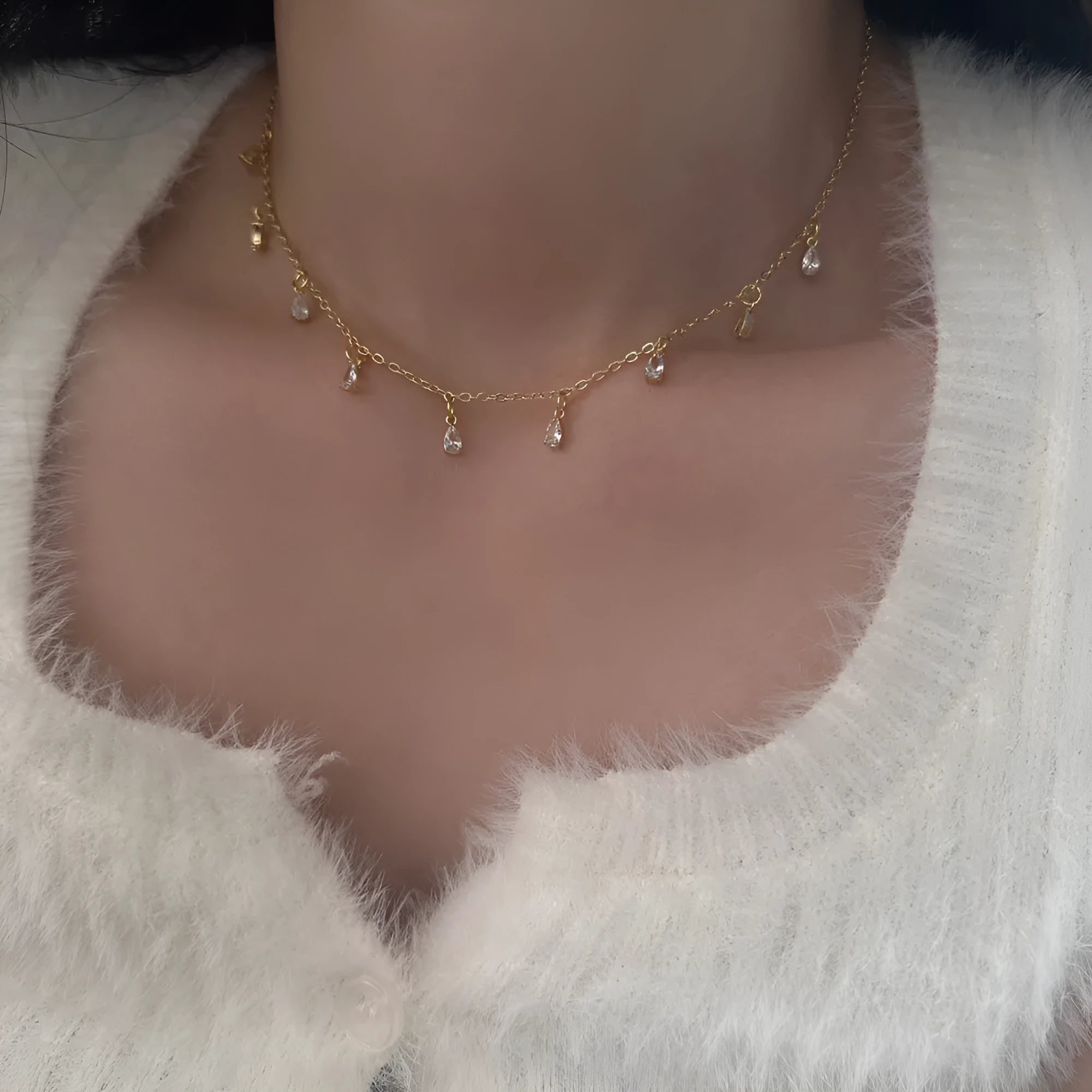 Women's zircon jewellery set showing necklace, earrings, and anklet with geometric meteor shower design.