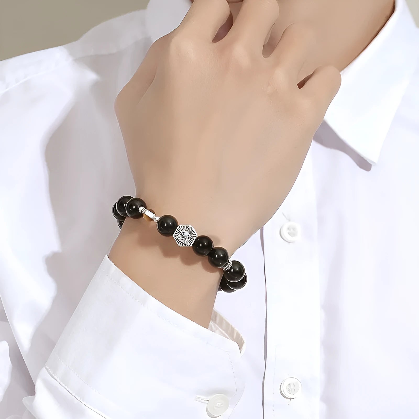 Men's sterling silver bracelet with obsidian god's eye geometric design