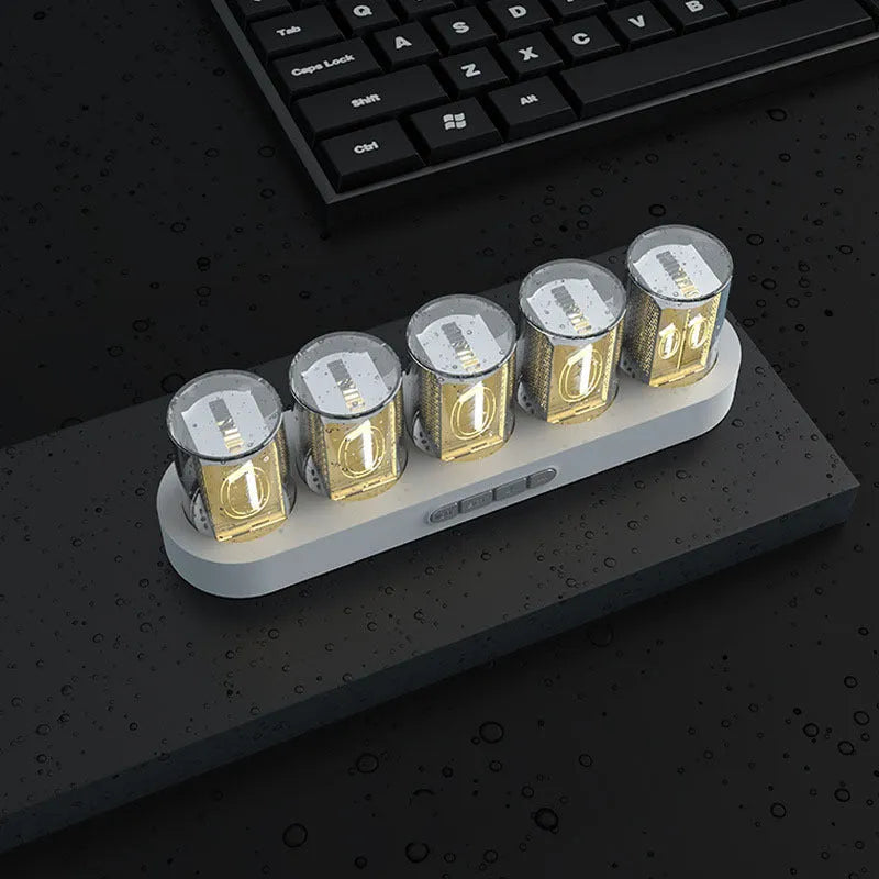 RGB LED digital tube clock displaying time with colourful lighting effects on desk