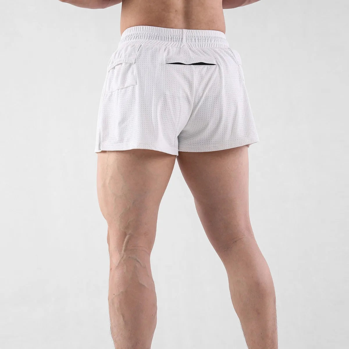 Men's black quick-drying nylon summer shorts with a mid waist and short length on a white background.