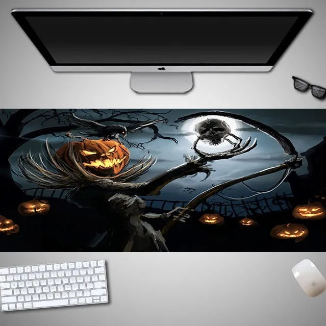 Large Halloween patterned gaming mouse pad on a desk showing non-slip rubber base and extra-long design.