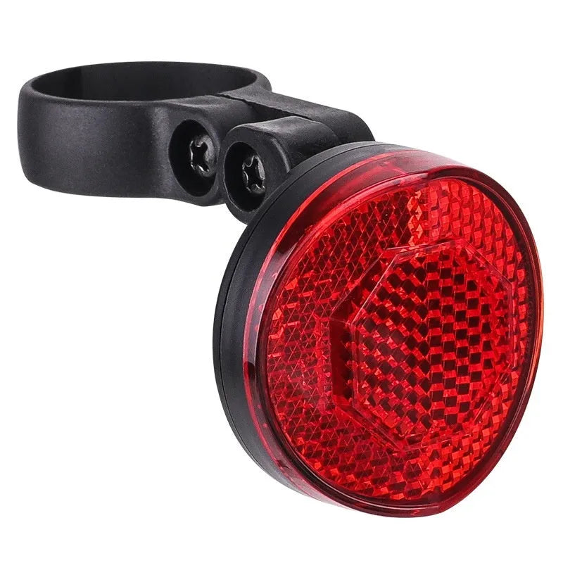 Red plastic bicycle seat post bracket for mounting a rear anti-theft taillight.