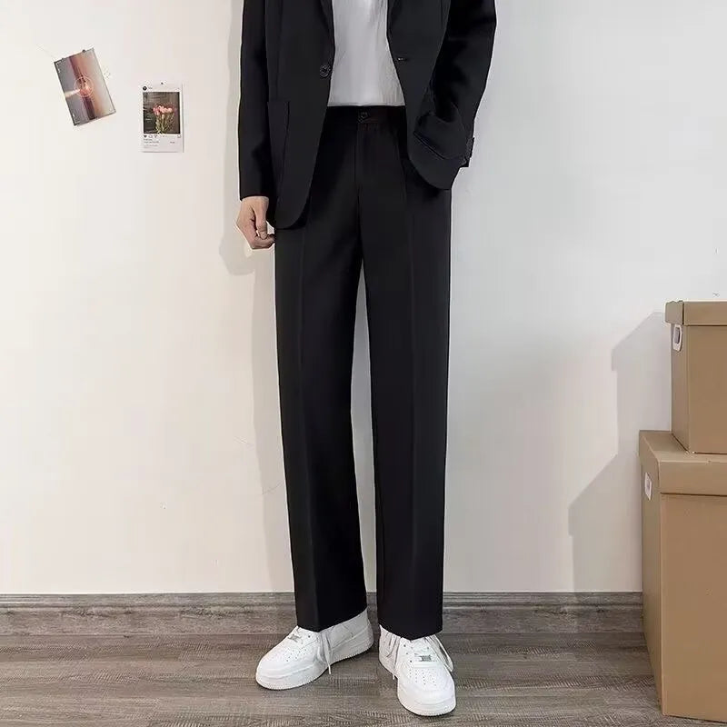 Plus size men's college style suit jacket in polyester with trousers, white shirt, and tie.