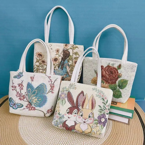 Canvas tote bag with gold wire embroidery in Bunny pattern, showing double-sided stitching detail