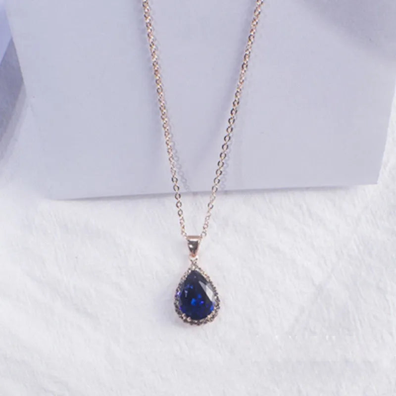 Women's drop shape necklace with geometric rhinestone pendant in multiple colour options