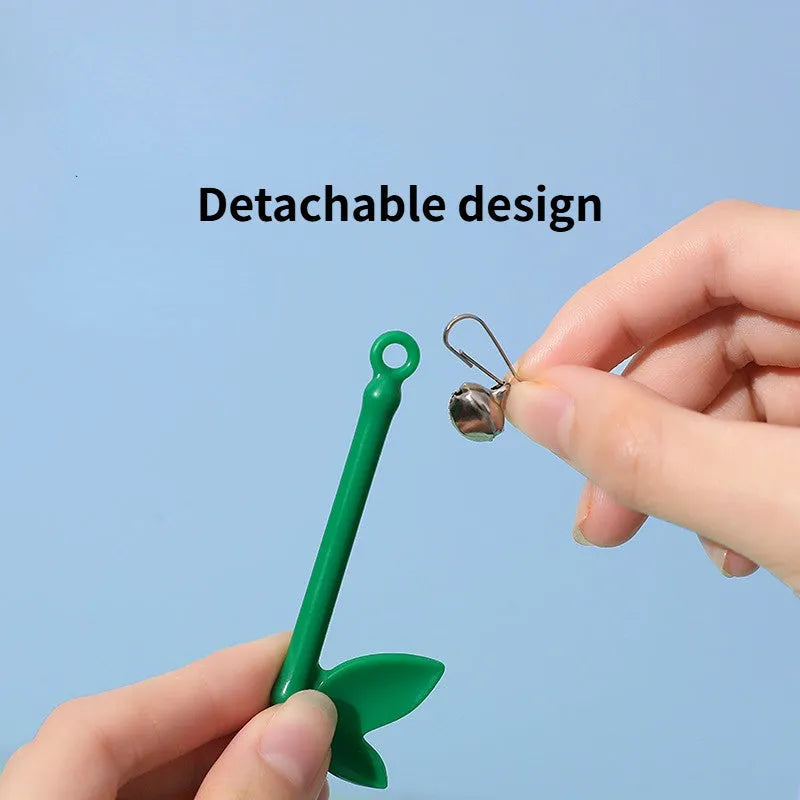 Green interactive cat feather wand toy with bell attachment on a durable stick