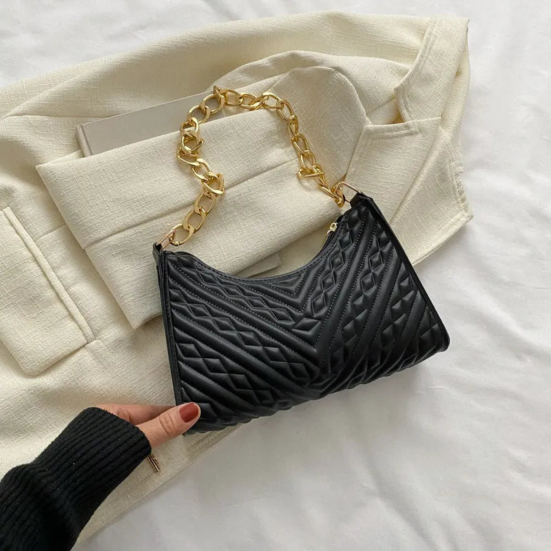 Brown pleated PU chain baguette shoulder bag showing square shape and soft handles.