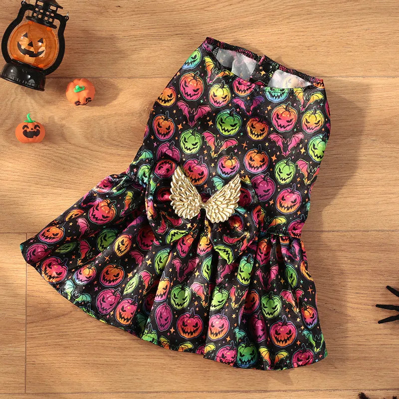 Orange and black Halloween dog costume with angel wings, shown in bright pumpkin and bright bat colours.