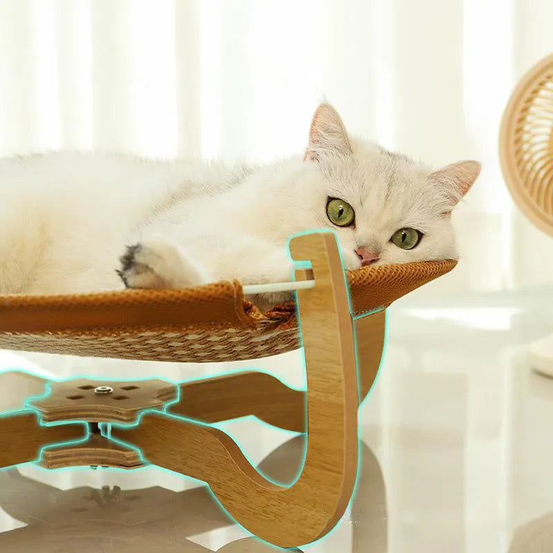 Brown woven rattan pet hammock bed raised off the ground