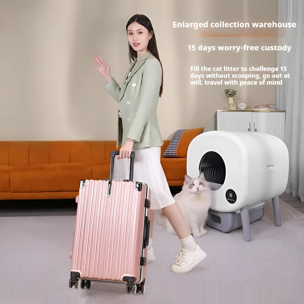White automatic self-cleaning cat litter box with control panel and waste storage drawer.