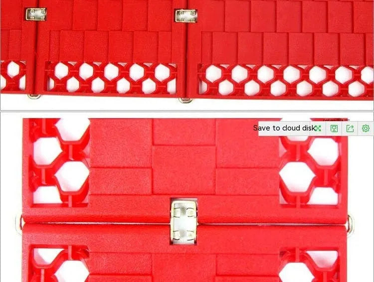 Orange folding vehicle rescue board showing rubber grip surface and folded size
