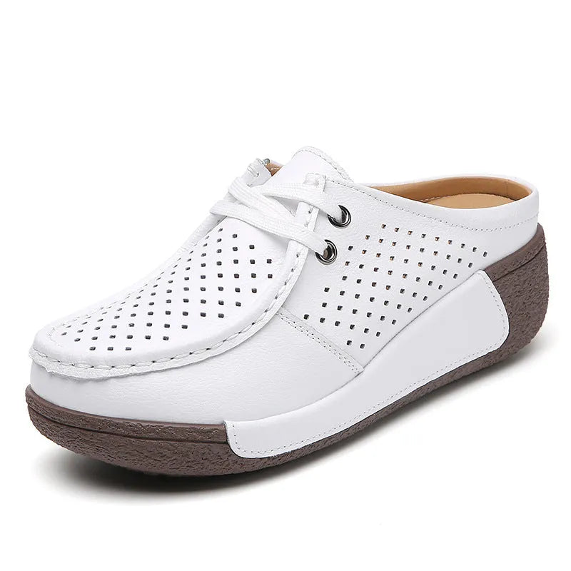 Plus size women's genuine leather platform slippers in black with round toe and hollow-out wedge sole