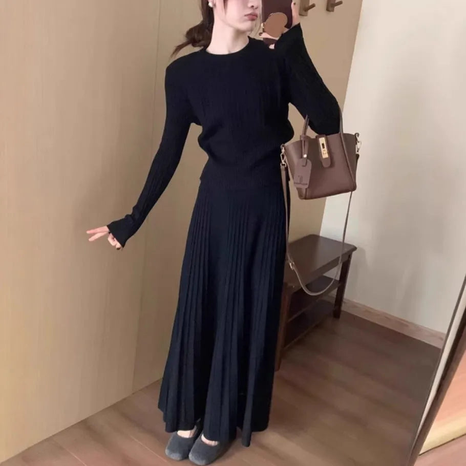 Women's dark grey knitted two-piece dress suit with 3D pattern and ethnic collage stitching.