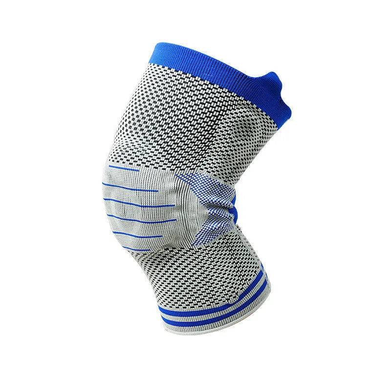 Silicone massage spring bar shock absorber knee protector in black and blue colour on leg.