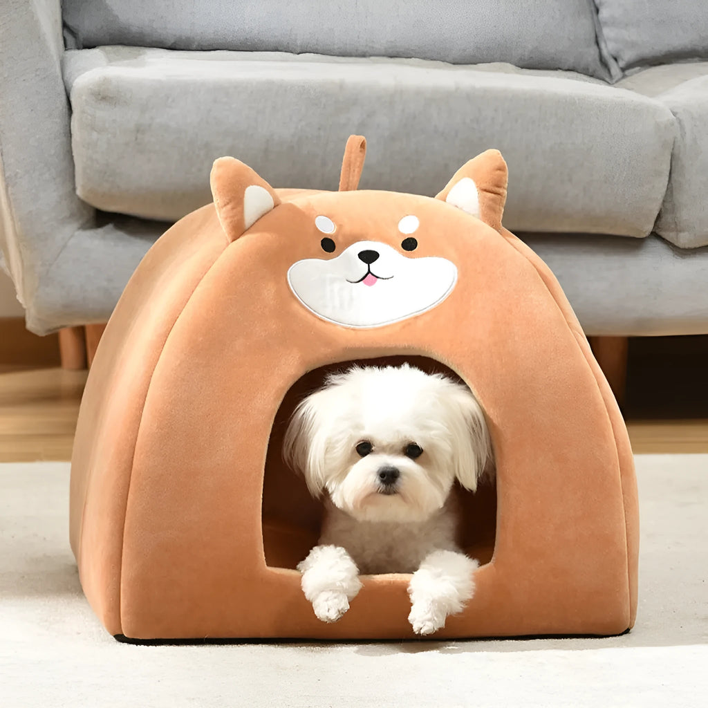 Grey soft cloth nest-style pet bed for cats and small dogs on a wooden floor.